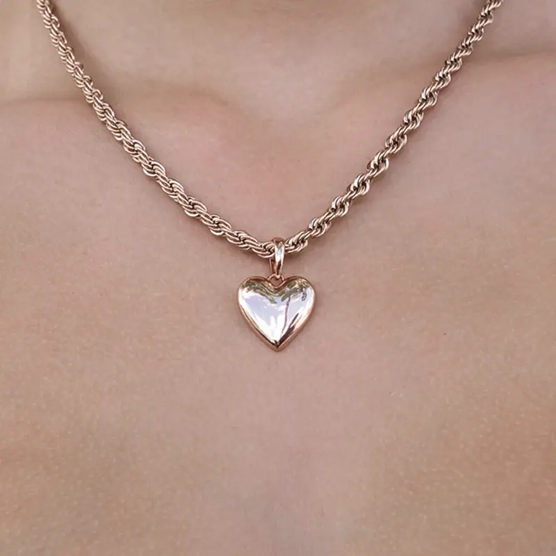 Minimalist Micro Heart Pendant In Rose Gold 1