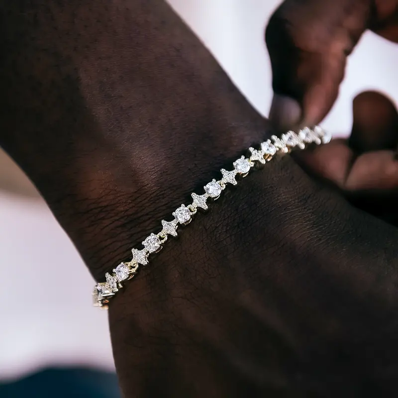 Yellow Gold Star Tennis Bracelet Featuring Round Gemstones 1